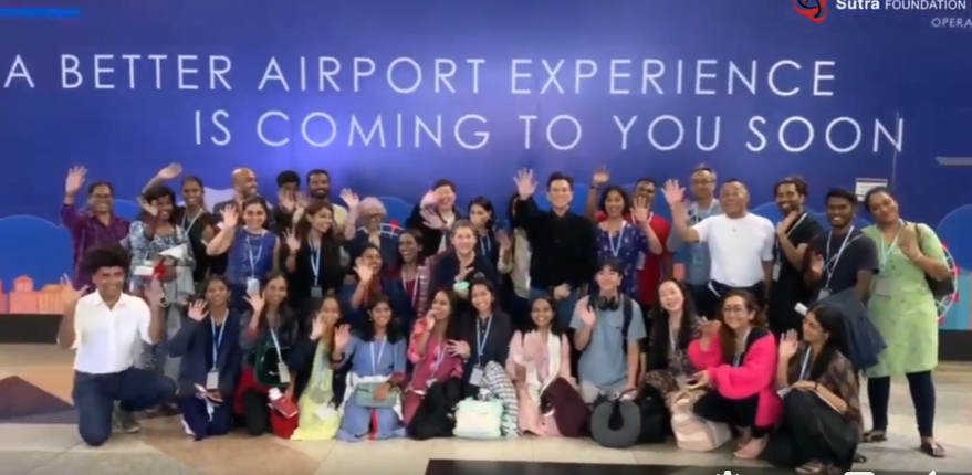Sutra dancers and friends prepare themselves for the flight to Bhubaneswar, India